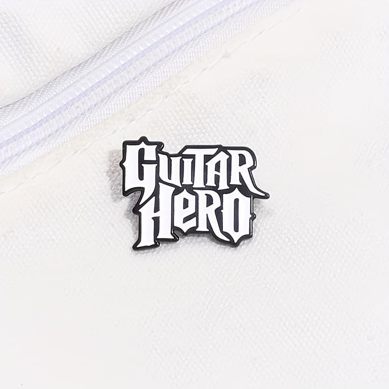 Héroe de la Guitarra: Insignia de Metal para Mochila, Abrigo o Gorra, Broche...